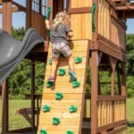 Backyard Discovery Skyfort II gray-slide playset 12-hold rock climbing wall
