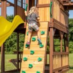 Backyard Discovery Skyfort II yellow variant rock climbing wall