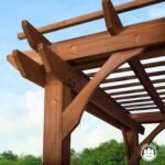 Beaumont 10 ft. x 10 ft. Outdoor Patio Pergola shown in an outdoor setting