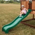 Echo Heights Wooden Kids' Backyard Playhouse shown in an outdoor setting