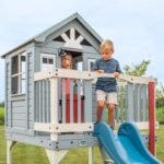 Beacon Heights Kids' Backyard Playhouse shown in an outdoor setting