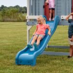 Beacon Heights Kids' Backyard Playhouse shown in an outdoor setting
