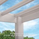 Windham Modern Steel 14 ft. x 12 ft. Pergola with Sail-Shade Canopy shown in an outdoor setting