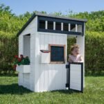 Backyard Discovery Caraway Cottage White wooden kids backyard playhouse