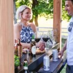 Cedar Springs Wood Patio Bar & Serving Station shown in an outdoor setting