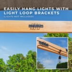 Brendan 12 ft. x 10 ft. Pergola with Sail-Shade Canopy shown in an outdoor setting