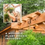 Bellerose 9 ft. x 6 ft. Wood Backyard Greenhouse Kit shown in an outdoor setting