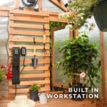 Bellerose 9 ft. x 6 ft. Wood Backyard Greenhouse Kit shown in an outdoor setting