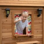 Backyard Discovery Aspen playhouse window with curtains
