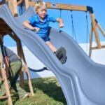 Dover Bay Wooden Backyard Playset & Swing Set with Monkey Bars swing area detail