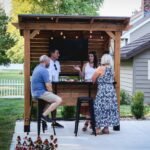 Cedar Springs Wood Patio Bar & Serving Station shown in an outdoor setting