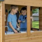 Backyard Discovery Mystic playhouse toy kitchen with sink and stovetop