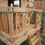 Backyard Discovery Malibu playset shaded lower deck play area