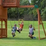 Backyard Discovery Skyfort II playset swing beam with belt swings and trapeze