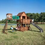 Backyard Discovery Woodridge Elite gray playset outdoor hero view